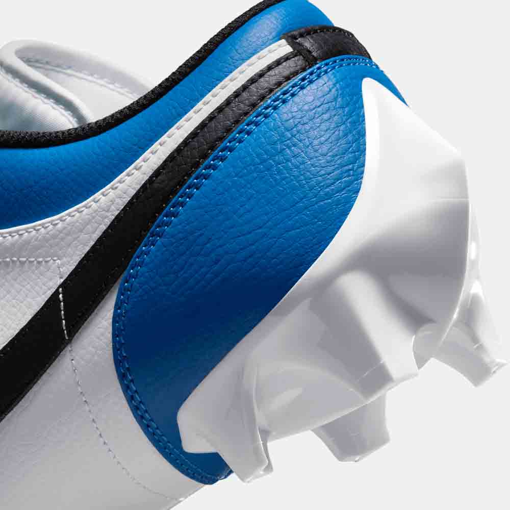 Up close, rear view of the Men's Jordan 1 Low TD Football Cleats 'White Black Royal'.